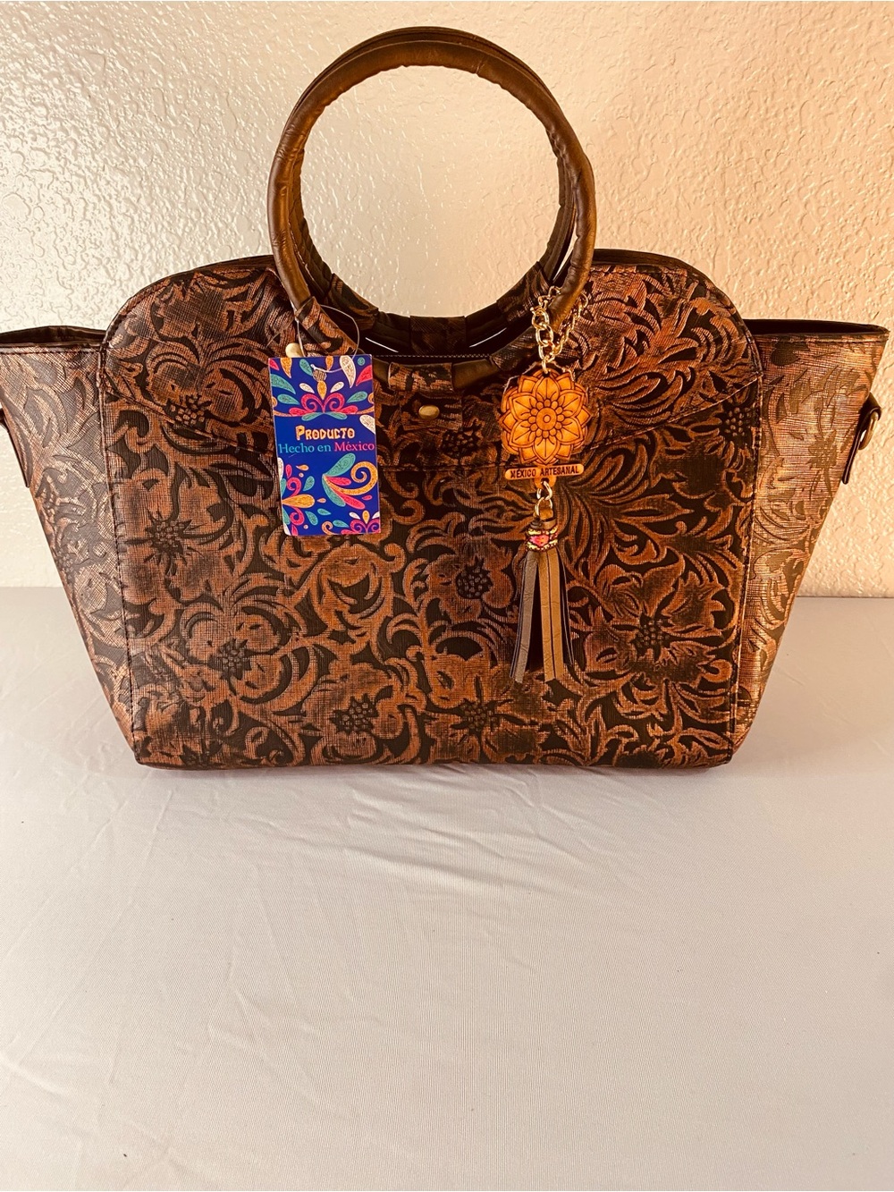 Floral Embossed Brown Tote with Tassel Charm